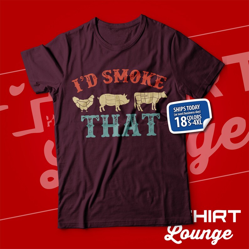 May include: A maroon t-shirt with a vintage-style graphic that says "I'd Smoke That" and features a chicken, pig, and cow. The graphic is in shades of blue, green, red, and yellow. The shirt also has a white label with the text "Ships Today (or next business day) 18 Colors S-4XL".