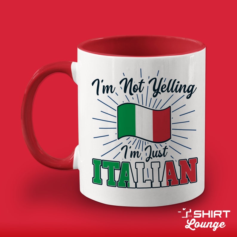 May include: White ceramic mug with a red rim and handle. The mug features a graphic of the Italian flag with the text "I'm Not Yelling I'm Just ITALIAN".