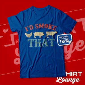 May include: A blue t-shirt with the text "I'D SMOKE THAT" in a vintage style font. The text is surrounded by images of a chicken, pig, and cow.