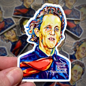 May include: A colorful sticker featuring a portrait of Temple Grandin, a renowned animal scientist and autism advocate. The sticker includes a quote from Grandin: "Animals Make Us Human."