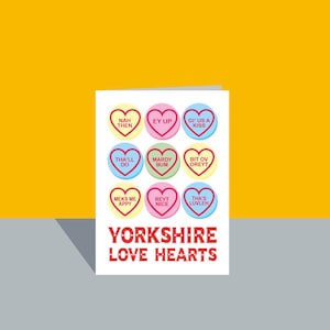 May include: A card with nine heart-shaped candies with Yorkshire sayings on them. The card says "Yorkshire Love Hearts" at the bottom.