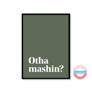 May include: A green poster with white text that reads "Otha mashin?" in a bold font. The poster is framed in a black frame.
