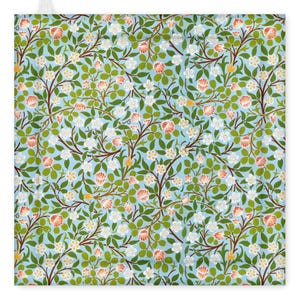 May include: A square, pale blue floral pattern with a repeating design of white and red flowers, green leaves, and brown branches. The design is reminiscent of a botanical illustration, suitable for home decor or fabric.