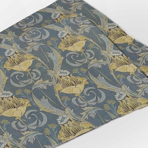 May include: A blue and yellow floral patterned fabric with a repeating design of stylized flowers and leaves.