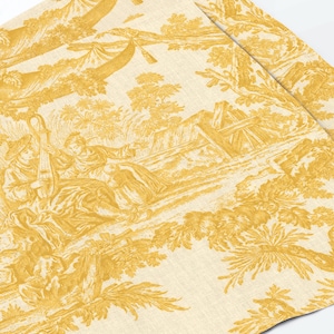 May include: A fabric textile featuring a yellow toile de jouy pattern on a cream background. The design depicts pastoral scenes with figures, trees, and foliage in a monochromatic yellow print, showcasing a repeating narrative illustration.