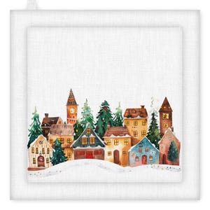 May include: A white square kitchen towel with a watercolour illustration of a winter village scene. The scene features colourful houses, evergreen trees, and a clock tower, set against a snowy landscape.