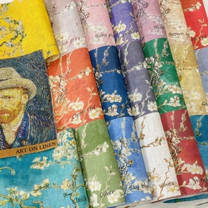 Op de afbeelding: Een verzameling van 10 stofstalen met een schilderij van een bloeiende amandelboom. De stalen zijn in verschillende kleuren, waaronder geel, rood, blauw, groen en wit. De tekst "ART ON LINEN" is zichtbaar op de stof.
