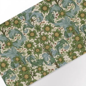 May include: A vintage floral pattern with green leaves, blue swirls, and yellow flowers on a cream background.