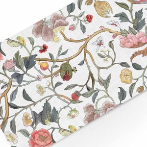 May include: A white background with a repeating pattern of floral designs. The design features pink, red, yellow, and green flowers and leaves. The flowers are stylised and have a watercolour look.