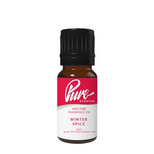 May include: An amber glass bottle with a black cap. The label is red and white, with the words "Pure Scented", "100% Pure Fragrance Oil", "Winter Spice", and "10ml". The website www.PureScented.com is also printed on the label.