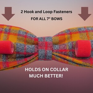 a close up of a bow tie on a purple background