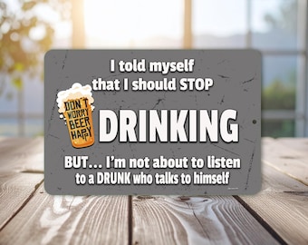 May include: A rectangular, gray metal sign with the text "I told myself that I should STOP DRINKING" in white. Below, it reads "BUT... I'm not about to listen to a DRUNK who talks to himself." A beer mug graphic is on the left.