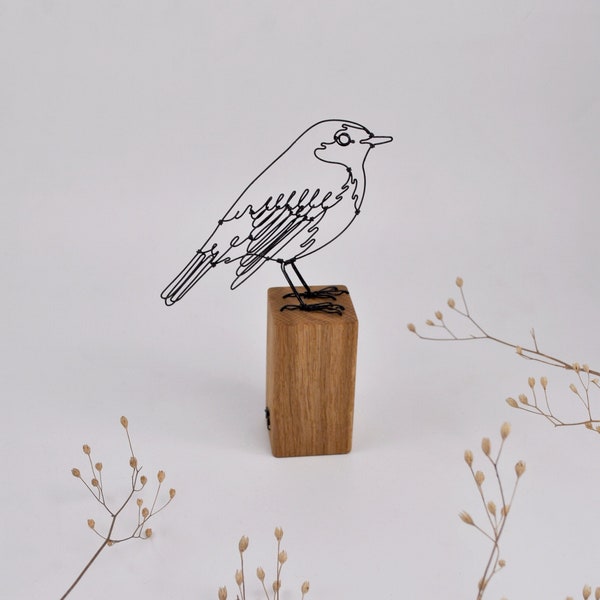 wire robin on oak base, interior decoration, decorative bird
