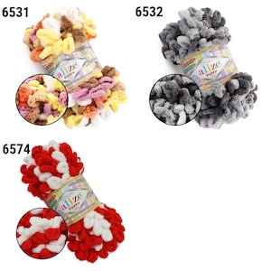 May include: Three skeins of Alize Puffy yarn in various colors. One skein is a mix of yellow, orange, pink, and brown. Another is shades of gray. The third is red and white. Each skein has a circular close-up of the yarn.