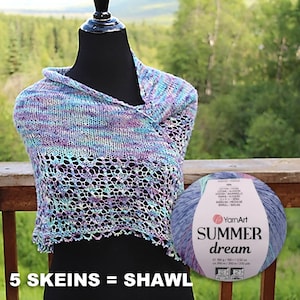 May include: A light blue, purple, and white crocheted shawl with a lacy pattern. The yarn ball is labeled "YarnArt Summer Dream" and is 100 grams, 3.52 ounces, 350 meters, and 370 yards. The text "5 Skeins = Shawl" is at the bottom of the image.