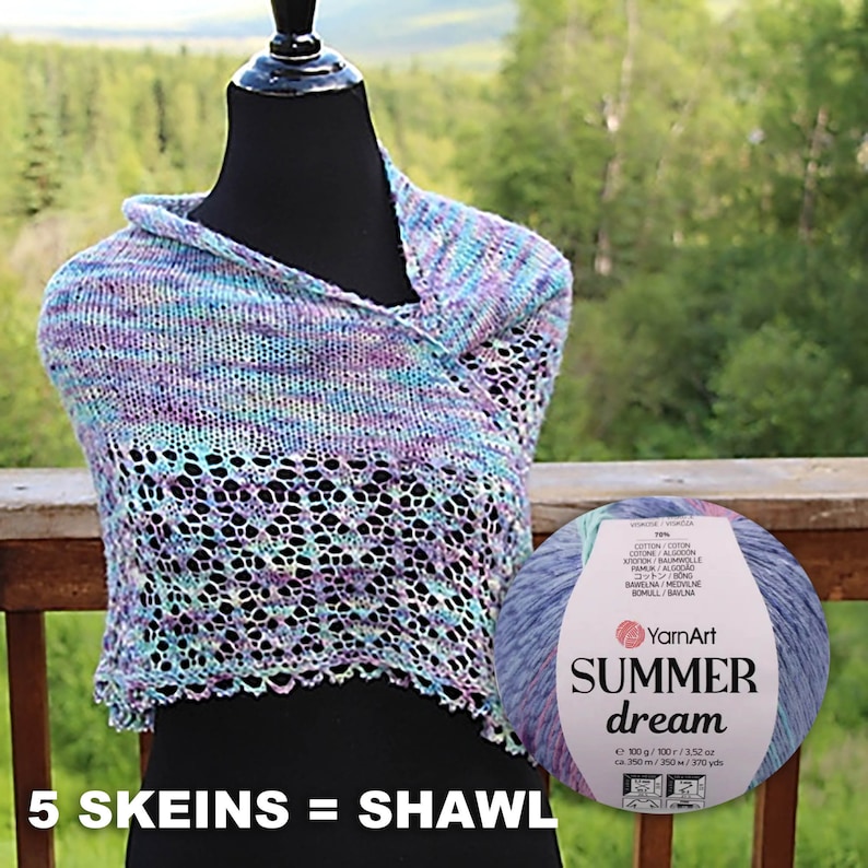 May include: A light blue, purple, and white crocheted shawl with a lacy pattern. The yarn ball is labeled "YarnArt Summer Dream" and is 100 grams, 3.52 ounces, 350 meters, and 370 yards. The text "5 Skeins = Shawl" is at the bottom of the image.