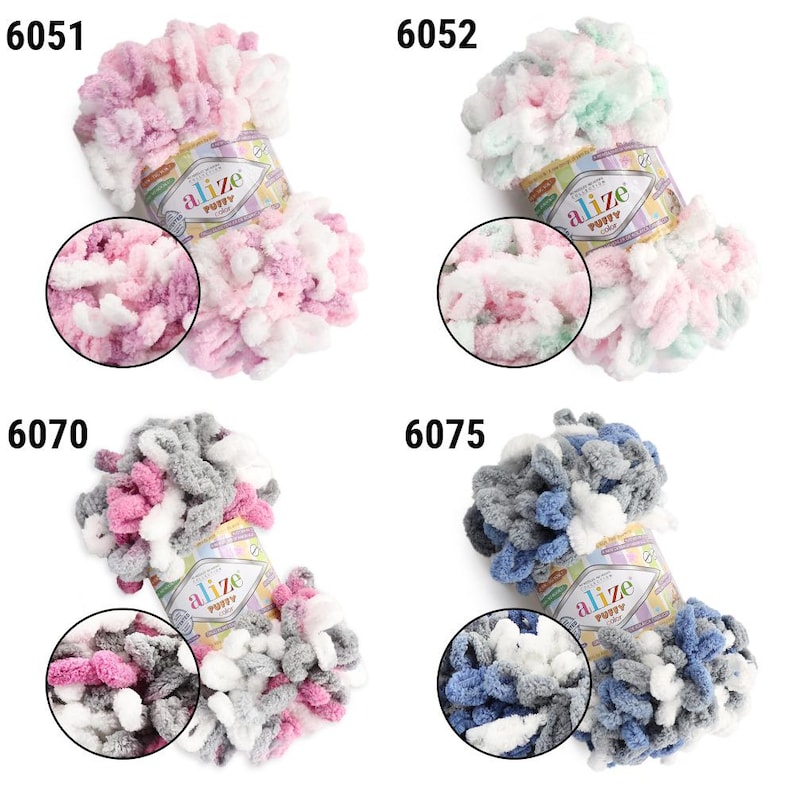 May include: Four skeins of Alize Puffy yarn in various color combinations. The top left skein is pink and white, the top right is pink, white, and green, the bottom left is gray, pink, and white, and the bottom right is blue, gray, and white.