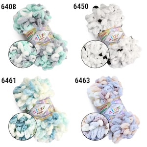 May include: Four skeins of Alize Puffy yarn in various colors. The colors include a mix of mint green, gray, and white; white with black accents; light blue and white; and a blend of pastel blues, pinks, and creams. Each skein has a close-up view of the yarn.