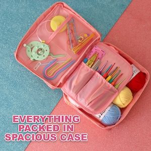 May include: Pink zippered case with multiple compartments, filled with colourful crochet hooks, yarn, and other craft supplies. The case is open and the contents are visible. The text "EVERYTHING PACKED IN SPACIOUS CASE" is printed below the case.