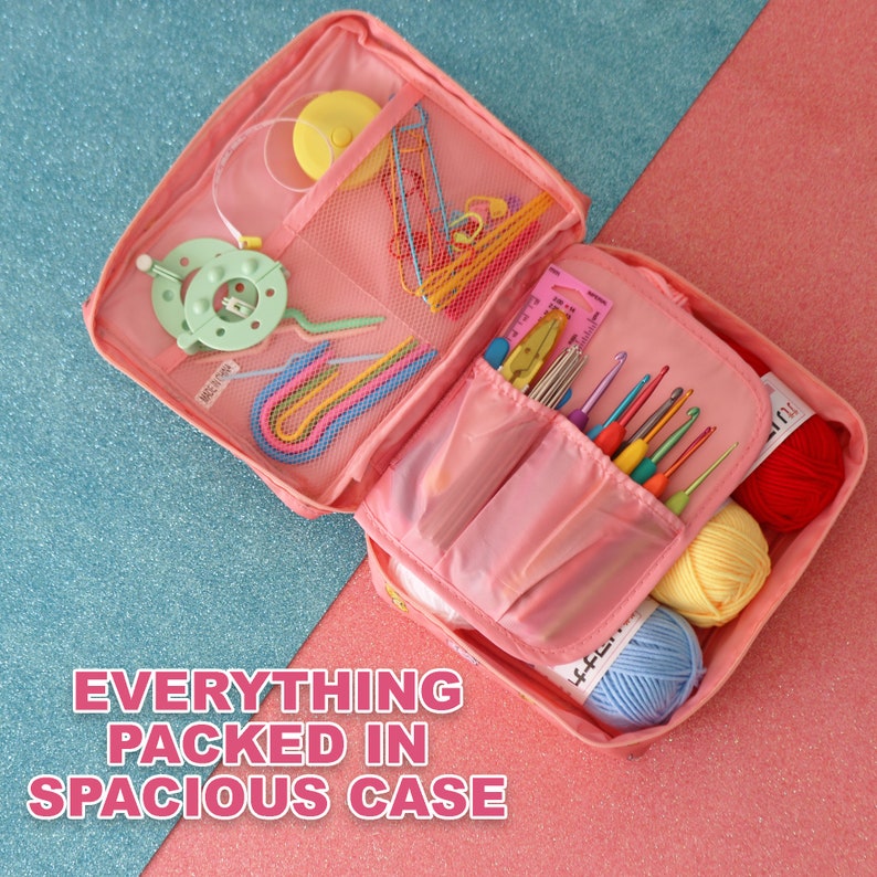 May include: Pink zippered case with multiple compartments, filled with colourful crochet hooks, yarn, and other craft supplies. The case is open and the contents are visible. The text "EVERYTHING PACKED IN SPACIOUS CASE" is printed below the case.