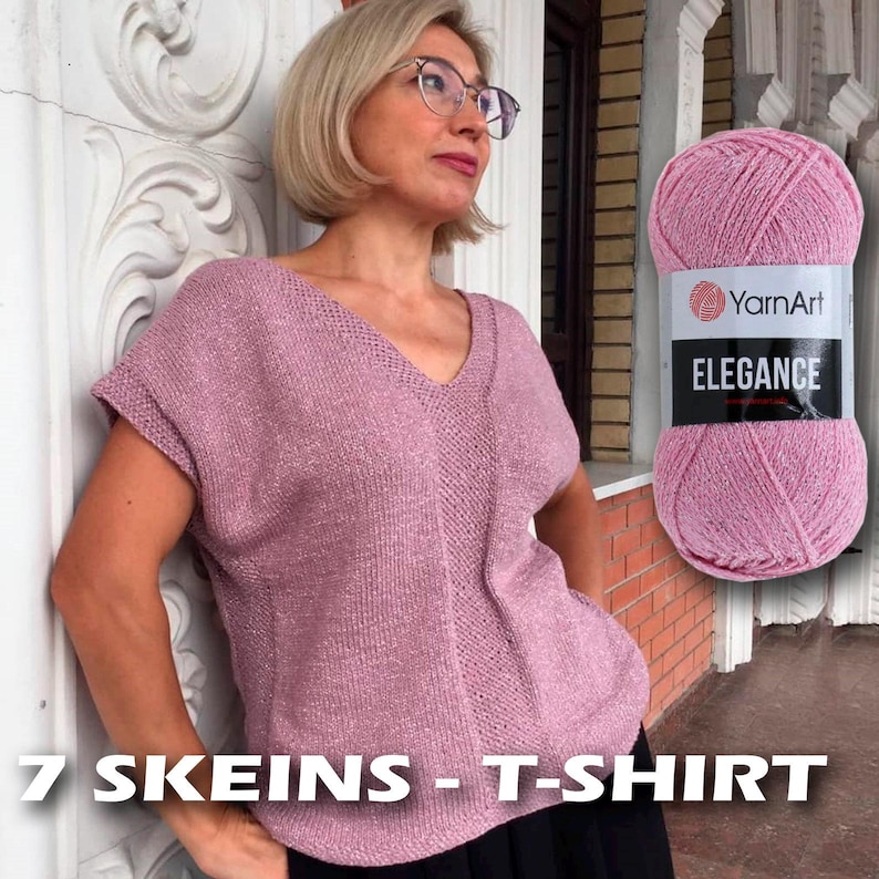 May include: A pink t-shirt made with YarnArt Elegance yarn. The t-shirt is shown on a person and has a v-neck and short sleeves. The text "7 SKEINS - T-SHIRT" is at the bottom of the image.