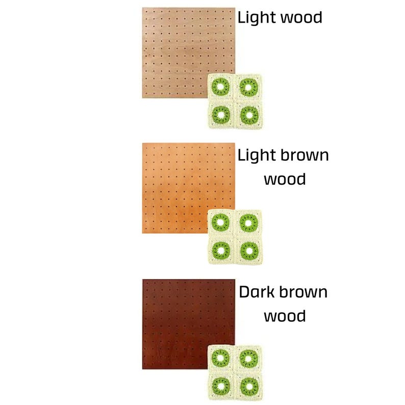 May include: Three square wooden pegboards in light, light brown, and dark brown. Each board has a grid of small holes. Below each board are four crocheted squares with a kiwi fruit design in green and white.