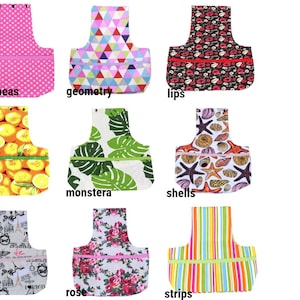 May include: Ten different fabric designs for a small tote bag. The designs include white peas, geometry, lips, lemon, monstera, shells, paris, rose, strips, and a floral design.