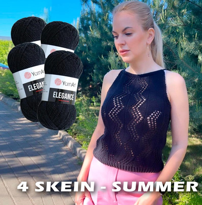May include: Four skeins of black yarn art elegance yarn, with the text "YarnArt Elegance" on the label. A woman is wearing a black crocheted top with a geometric pattern.