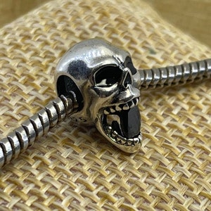 Sterling silver black onyx skull charm bead