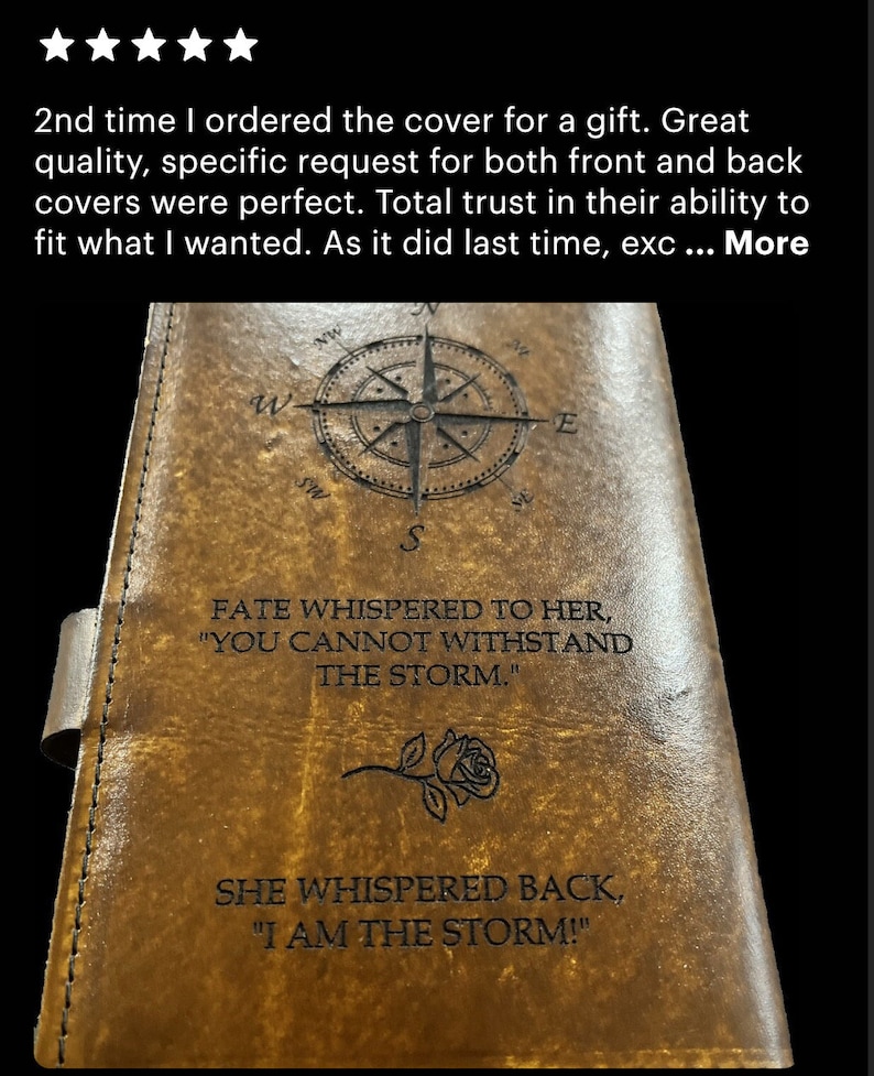May include: A brown leather journal cover with a compass design, a rose, and the text "Fate whispered to her, "You cannot withstand the storm." She whispered back, "I am the storm!"