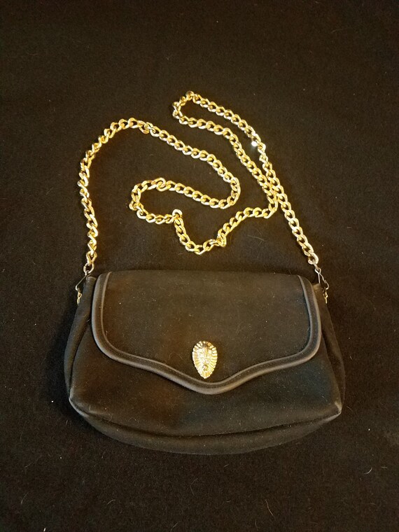 black clutch purse with gold chain