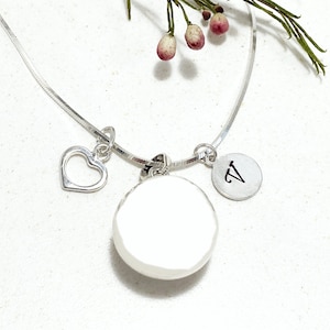 Angel calling bell necklace best sale