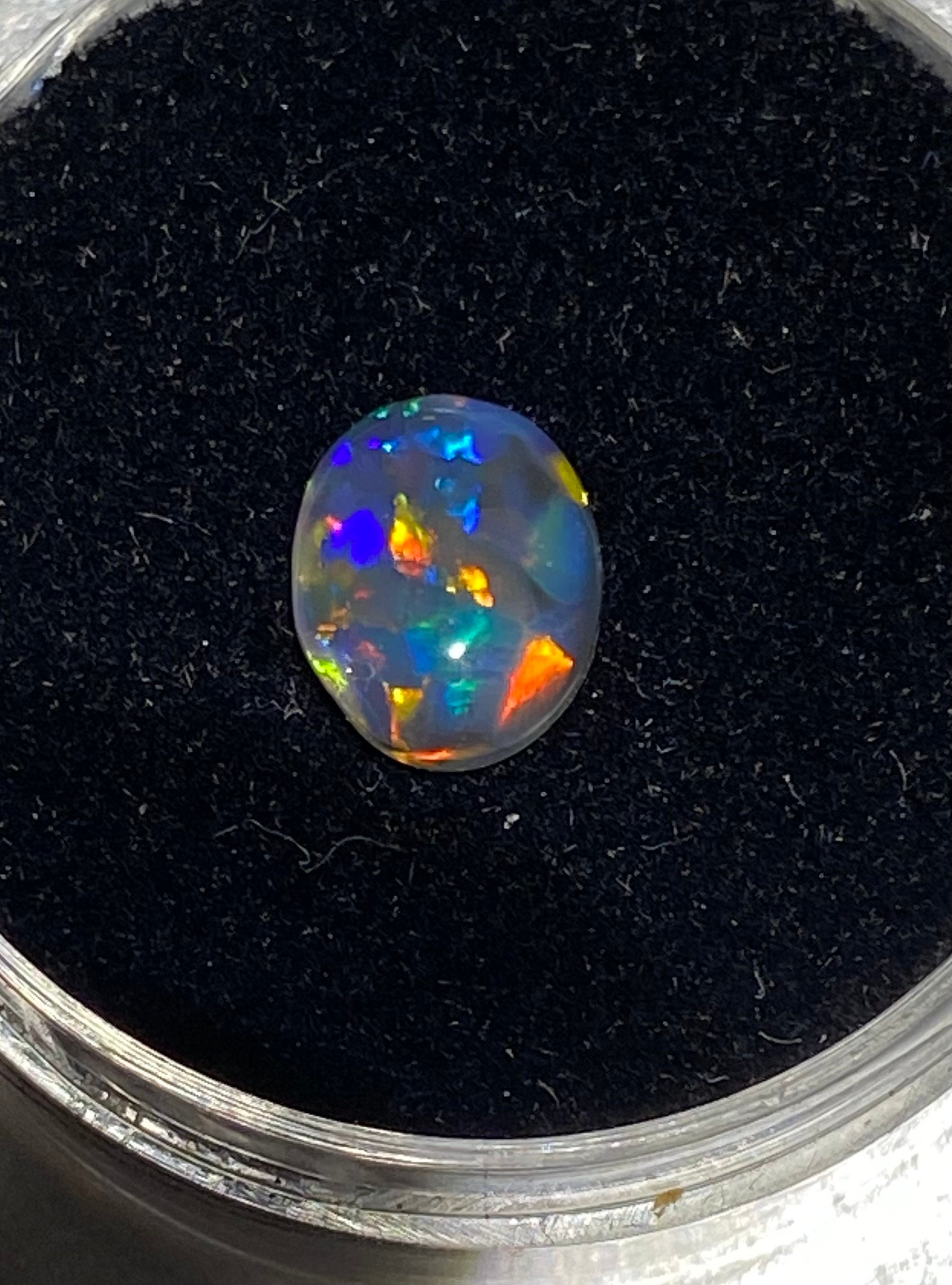 ブラックオパール ライトニングリッジ レインボーフラッシュ 0.75 ct