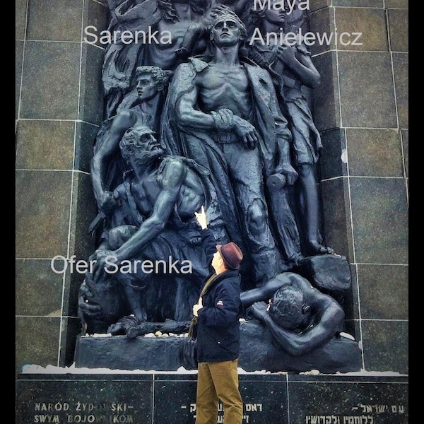 Me Ofer Sarenka Aloni salutes the famous statue in Warsaw where my cousin and aunt are sculpted