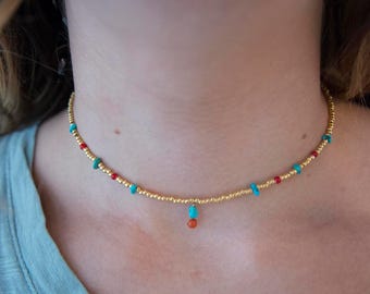 Coral, turquoise and gold beaded choker with pendant