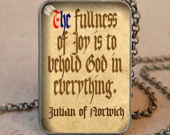 May include: Antique bronze necklace with a rectangular pendant. The pendant features a quote from Julian of Norwich: "The fullness of joy is to behold God in everything." The text is in a vintage style font. The necklace is a religious item.
