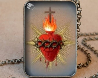 Collar colgante del Sagrado Corazón de Jesús, Sagrado Corazón de Jesús, Sacratissimum Cor Iesu, El amor ilimitado y apasionado de Dios por la humanidad