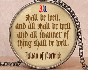May include: Antique bronze pendant necklace featuring a quote by Julian of Norwich: "All shall be well, and all shall be well, and all manner of thing shall be well." The text is in a vintage font. The necklace has a chain and clasp.