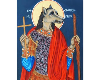 May include: A rectangular sticker featuring a stylized illustration of Saint Christopher with a wolf's head. The figure wears a red cloak, ornate armor, and holds a cross and staff against a dark blue background. The text "SAINT CHRISTOPHER" is written in white.