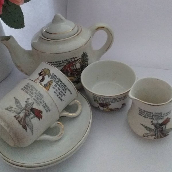 Shell childrens tea set 1920/30s Vintage Nursery Rhyme tea set from drawings done by Margaret Tarrant. Gold edged miniature tea for two set