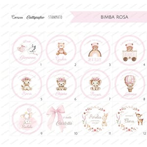May include: A collection of twelve pink and white circular stickers with illustrations of animals and text. The text includes names like Giovanna, Giulia, Beatrice, and Bianca. The stickers are for a baby girl.