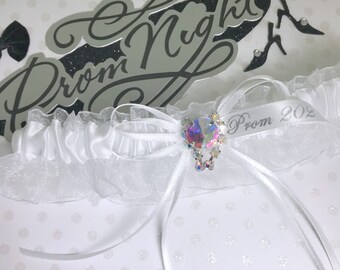 White prom garter with a rhinestone center.  Prom garters.  White prom garter.