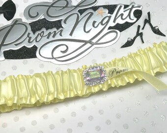 Yellow prom garter in iridescent jewel center,  Prom garter