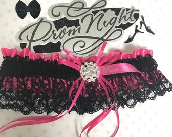Shocking pink and black prom garter.