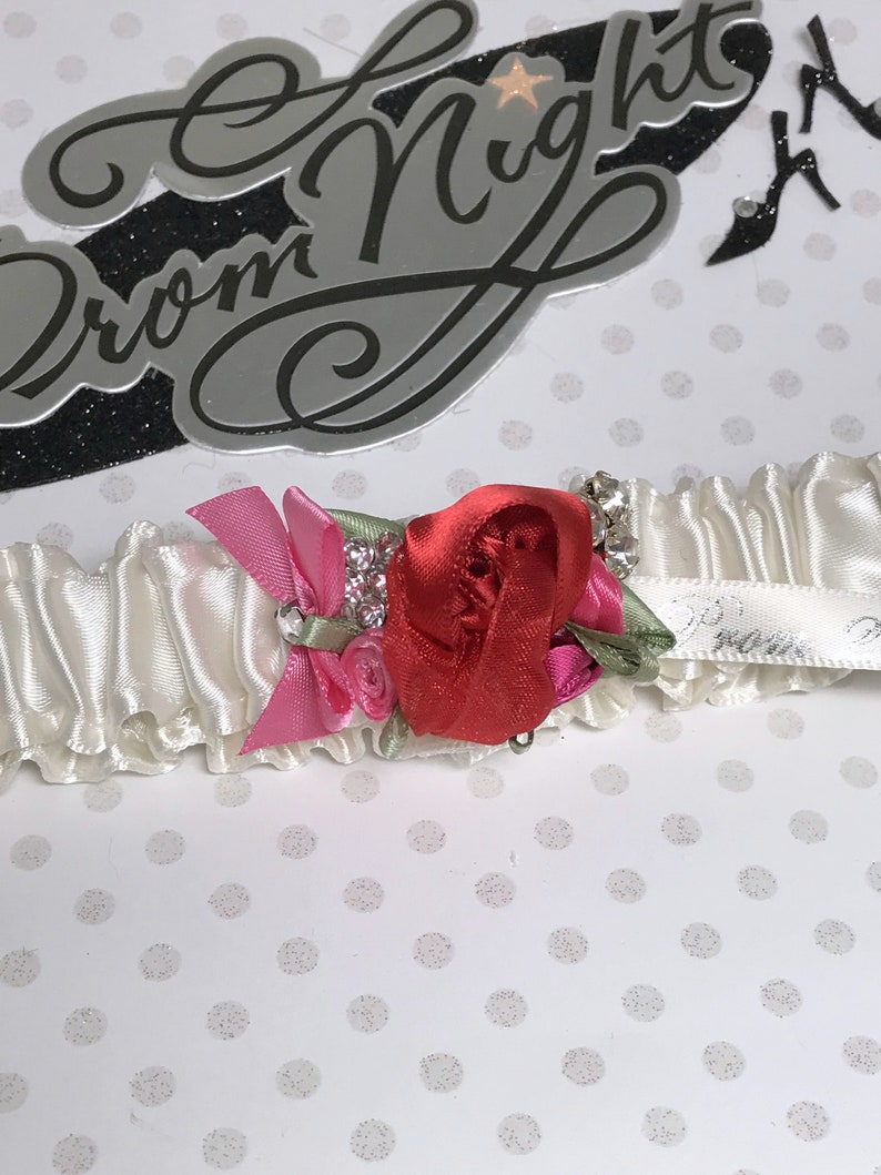 Prom garters. Ivory prom garter wred,ht.pink,fuchsia roses