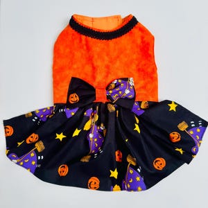 Handmade Halloween Dog Dress: Orange and Black pumpkin and witch print.