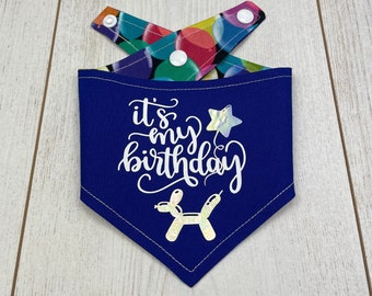 Reversible Blue Birthday Dog Bandana with chrome vinyl balloon designs and balloon fabric.