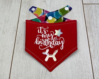 Reversible Red Birthday Dog Bandana with chrome vinyl balloon designs and balloon fabric.