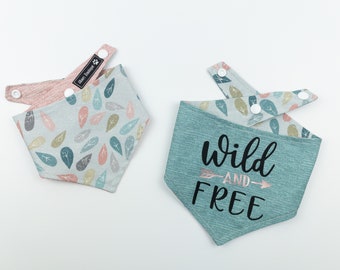 Reversible Dog Bandana in teal and leaf design with a wild and free print