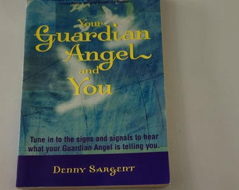 May include: A blue and yellow book titled "Your Guardian Angel and You" with the subtitle "Tune in to the signs and signals to hear what your Guardian Angel is telling you." The author is Denny Sargent.
